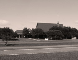 A black and white image of the church from outside