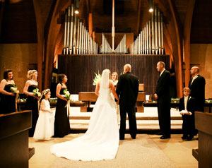 Image of a wedding taking place in the sanctuary